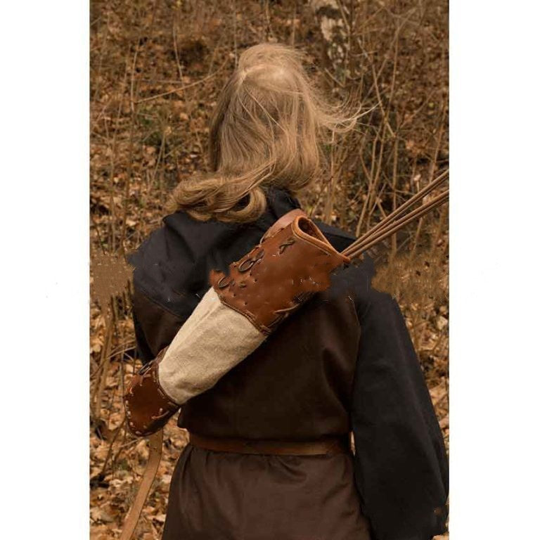 Rear view of the leather arrow quiver worn over the shoulder outdoors