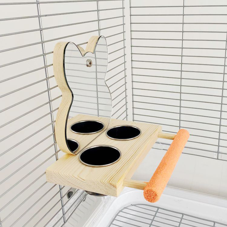 Bird cage perch stand with mirror and feed cups mounted in cage