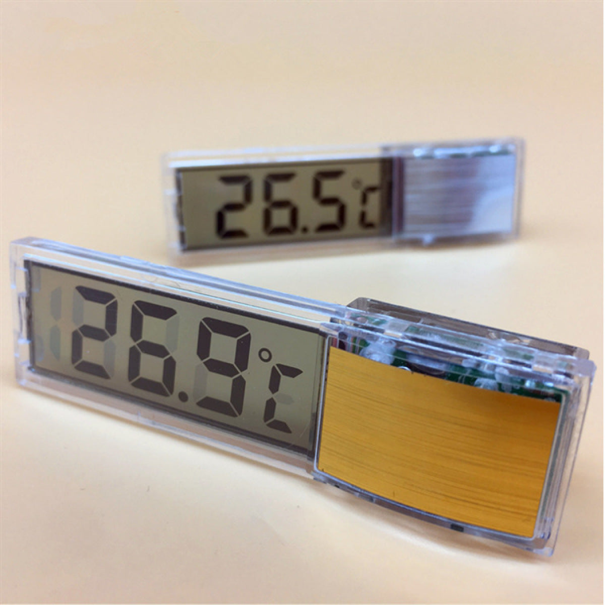 Close-up of digital aquarium thermometer LCD display