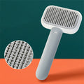 Self-cleaning cat grooming brush